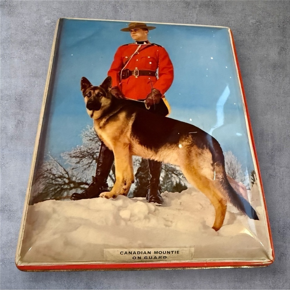 Vintage Riley's Toffee tin featuring a "Canadian Mountie on Guard"